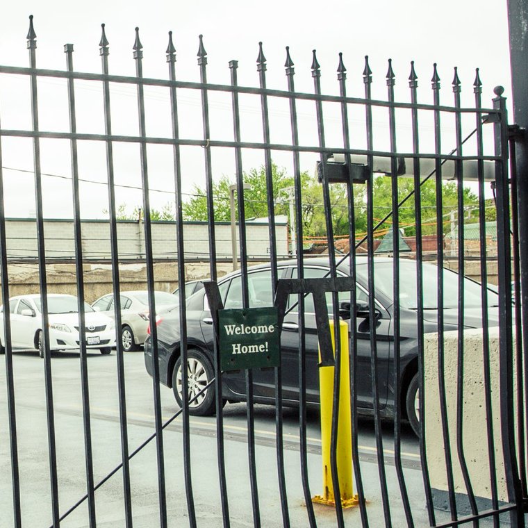 Gated Entrance with sign that reads 